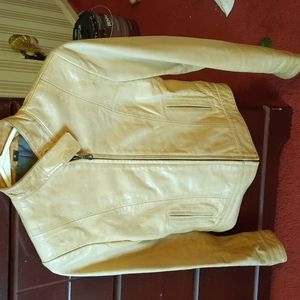 Butter soft leather jacket well kept for light color size s for petite person..